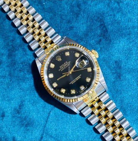 Authentic Rolex black diamond dial