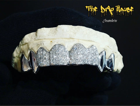 8 top or bottom, 4 fully flooded teeth