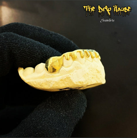 Solid 14k drip style Grillz